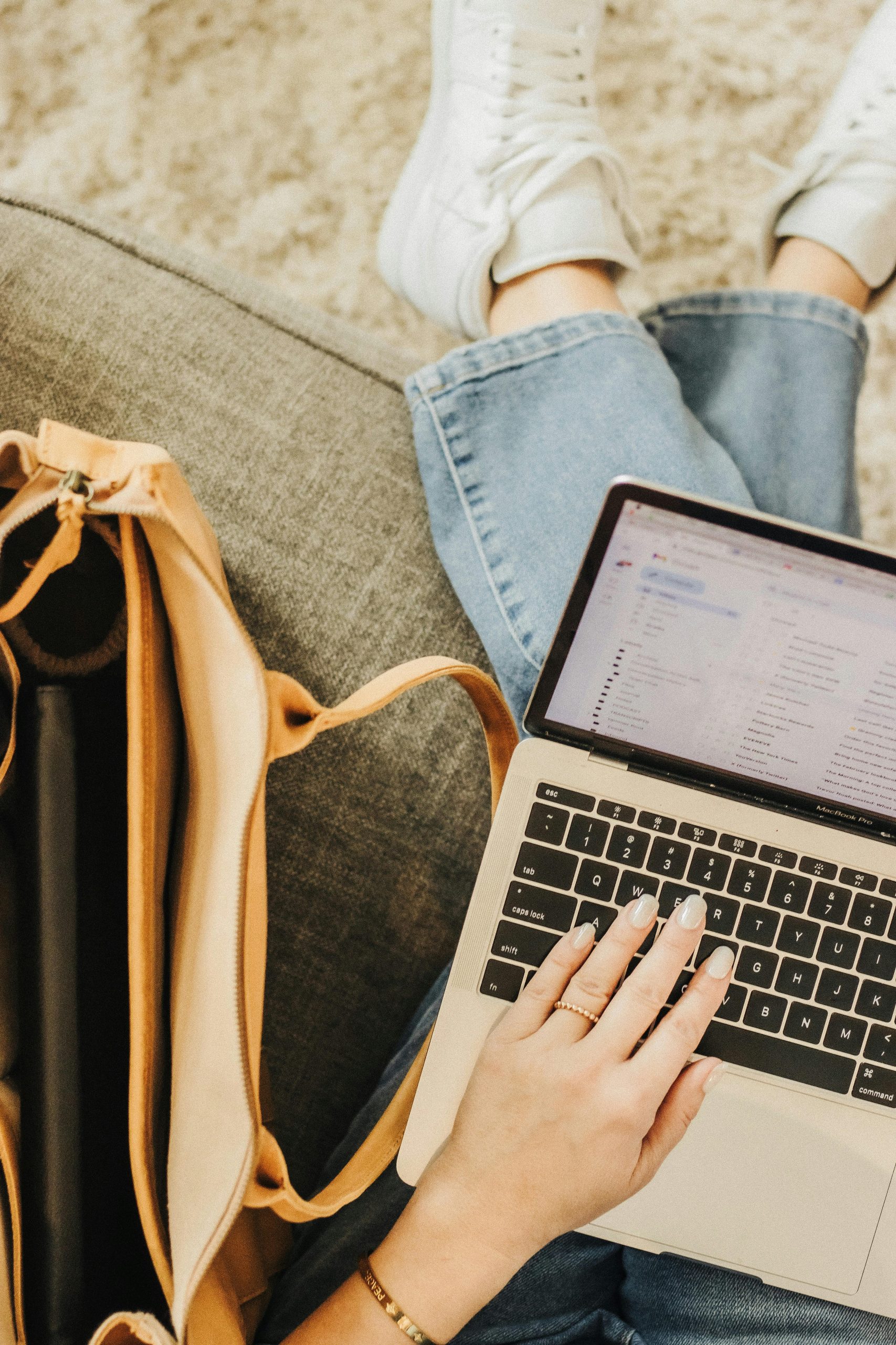 Avoid These 5 Common Mistakes in Your Ad Campaigns (And How to Fix Them) - Women on Laptop - Decorative Image