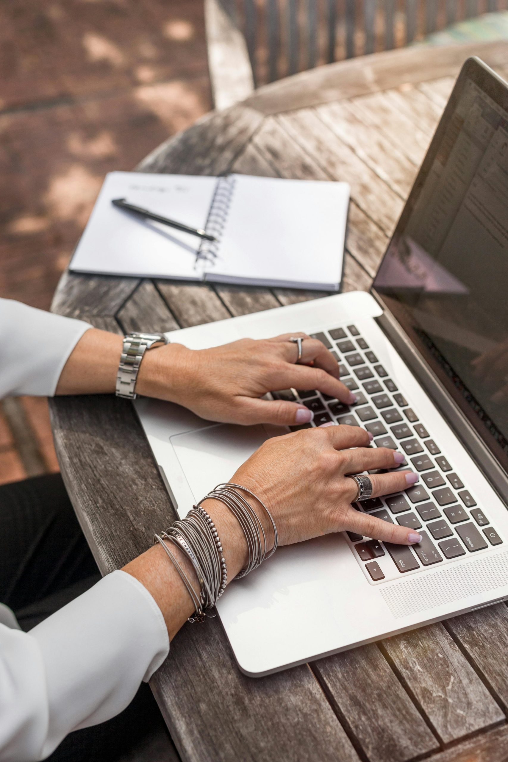 Digital Dawn - Women typing on Macbook